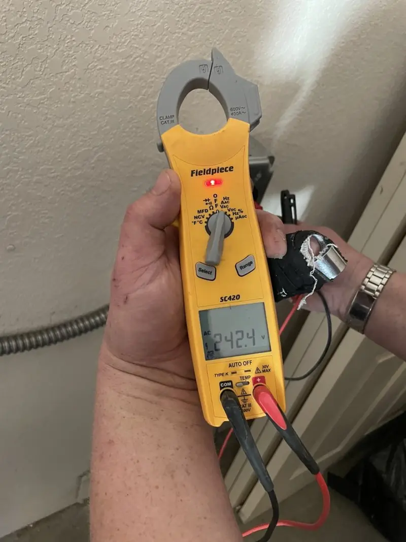 Voltage testing with clamp meter during Generator Installation in New Castle
